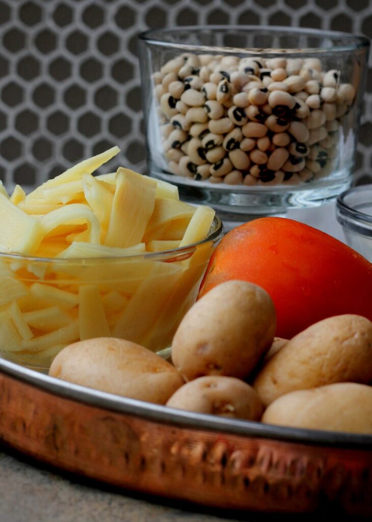 Bamboo shoots, potatoes and black-eyed peas for aloo tama bodi.