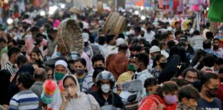 India crosses record-high 100,000 daily Covid-19 cases for first time