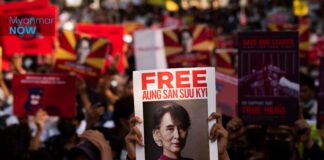 Aung San Suu Kyi charged with violating Official Secrets Act