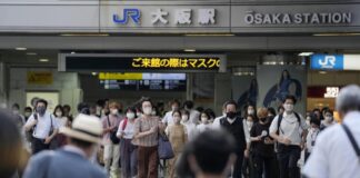 Japan expands states of emergency after record high covid infections amid Olympic Games