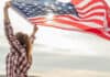 US Preparing Gulf Embassy Departures as Houthi Attacks Hit Saudi A young girl holding a U.S. flag. (Representative Image)