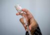 Moderna Shares Sink 25% After Detailed Cancer Vaccine Data A hand holds a Moderna COVID-19 vaccine vial while drawing the vaccine into a syringe. (Photo: AFP)
