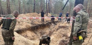 Ukraine says mass grave found in Izium where Russians ousted days ago