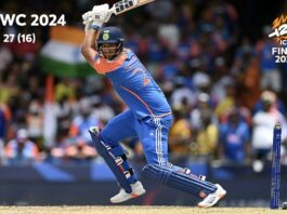 India Storms to History With Third T20 World Cup Title Indian cricketer raises his bat during a celebratory moment after India won its third T20 World Cup title.