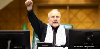 Iran Denies Trump’s Claim of Talks as U.S. Delays Planned Strikes