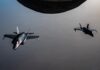 U.S. Strikes Iran After Apache Downing; Tehran Vows Response Two U.S. Air Force F-35A stealth fighter jets fly over the Middle East during a patrol ahead of U.S. strikes on Iranian air defense sites near the Strait of Hormuz