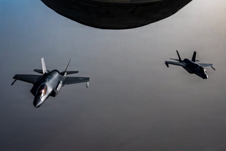 Two U.S. Air Force F-35A stealth fighter jets fly over the Middle East during a patrol ahead of U.S. strikes on Iranian air defense sites near the Strait of Hormuz