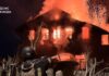 Ukraine Reports Two Killed, 28 Hurt in Kharkiv as Strikes Continue A firefighter sprays water at a burning building in an image shared during reports of Russian strikes on Ukraine.