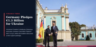Volodymyr Zelenskyy and Friedrich Merz stand on a red carpet beside German and Ukrainian flags in Kyiv