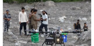 A cargo drone fitted with supply containers near the Trisuli River in Nepal. (Nepal Photo Library via Ratopati)