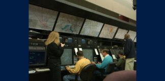 Air traffic controllers at work at Washington ARTCC; file photo accompanying coverage of the air traffic controller pay raise.