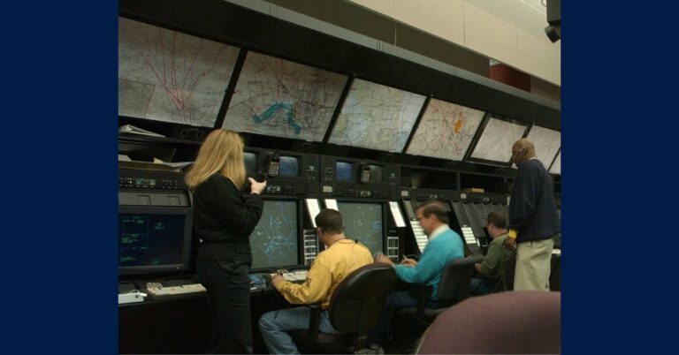 Air traffic controllers at work at Washington ARTCC; file photo accompanying coverage of the air traffic controller pay raise.