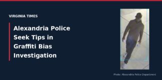 Alexandria graffiti investigation person of interest wearing a cap, long-sleeve top, dark pants and white sneakers in a police image