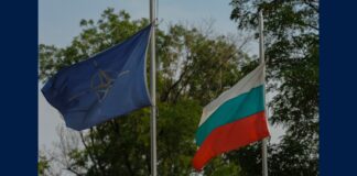 The NATO and Bulgarian flags fly side by side at Graf Ignatievo Air Base, Bulgaria, as the country prepares to join the Bulgaria NATO anti-drone initiative.