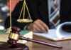 Fifth Circuit Rejects Bond Hearing Right for Three Detainees Judge’s gavel and balance scales illustrating the Fifth Circuit bond hearing ruling.
