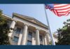Ex-FBI Leaders Surrender, Accused of Lying to Congress on Hunter Biden A U.S. flag flies outside a columned federal building in this Justice Department photo.