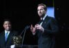 Harry Kane Wins 2026 Ballon d’Or After 61-Goal Season Harry Kane speaks at the podium with the Ballon d'Or trophy after winning the 2026 award, Harry Kane Ballon d'Or 2026