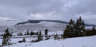 Snow-covered Highland Valley Copper open-pit mine near Logan Lake, British Columbia