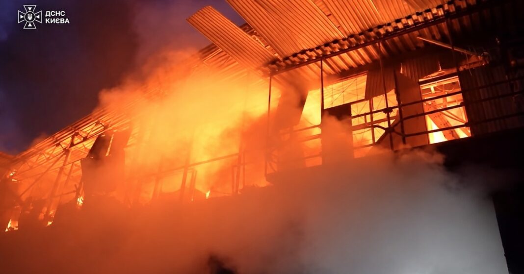 A building burns in Kyiv during Russia's overnight missile and drone strikes, in a photo from Ukraine's State Emergency Service. (State Emergency Service of Ukraine)