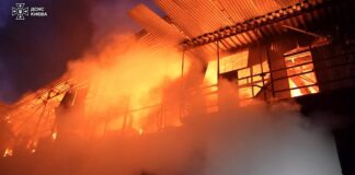 A building burns in Kyiv during Russia's overnight missile and drone strikes, in a photo from Ukraine's State Emergency Service. (State Emergency Service of Ukraine)