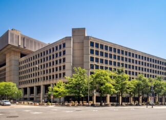 DOJ Adds Obstruction Count Against Two Ex-FBI Officials The J. Edgar Hoover Building, FBI headquarters in Washington, D.C. — prosecutors add obstruction count in case against ex-FBI officials.