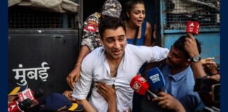 Actor Imran Khan speaking to reporters as he is detained by police during a protest at August Kranti Maidan in Mumbai.