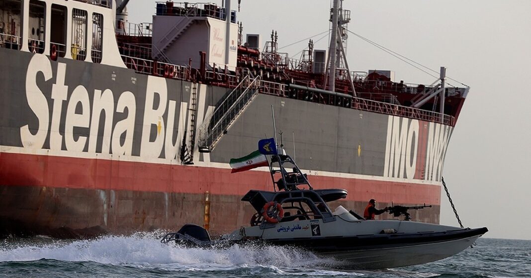IRGC speedboat beside the tanker Stena Impero in the Strait of Hormuz — Iran Guards tanker mines claim
