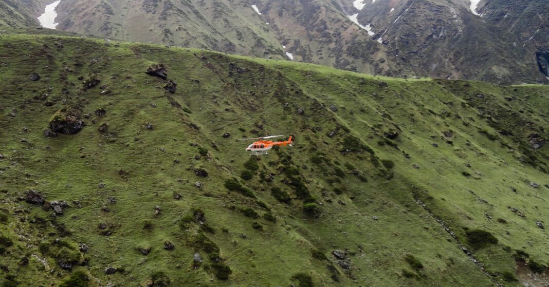 A helicopter carrying pilgrims over the Himalayas in Uttarakhand, in a file photo related to the Badrinath helicopter crash near Joshimath