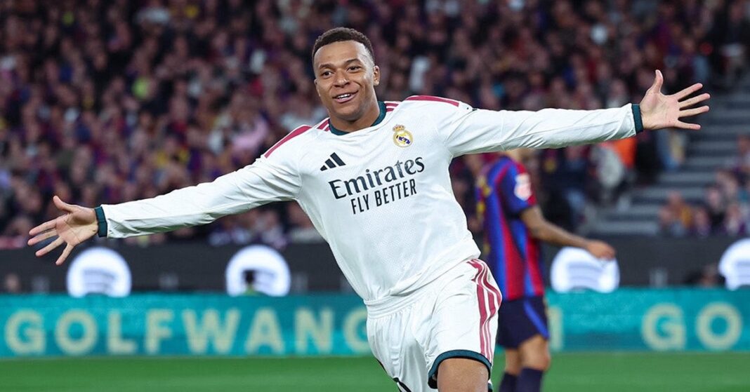 Kylian Mbappé celebrates during a soccer match