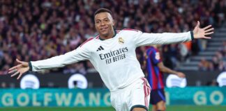 Kylian Mbappé celebrates during a soccer match