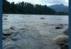 Climate Fund Provisionally Sets Aside $21.6 Million for Nepal Trishuli River flowing around rocks in Nepal in a 2017 file photo accompanying a Nepal flood recovery report.