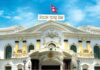 Nepal Takes Government Systems Offline to Patch PHP Security Flaws Nepal Rastra Bank building with Nepal’s flag on the roof, illustrating Nepal PHP security patches coverage