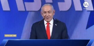 Benjamin Netanyahu speaking at a lectern in a Channel 14 broadcast screenshot accompanying coverage of Netanyahu election claims.