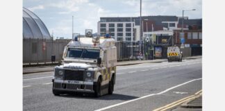 PSNI vehicles in Belfast in a file photo used with coverage of Northern Ireland school threats.