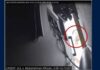 OpenAI Engineer Charged Over Hidden Office Recording Device Surveillance still from the federal complaint showing Abdulrahman Alfozan, circled in red, looking behind a television in an OpenAI executive conference room on Oct. 5, 2026.