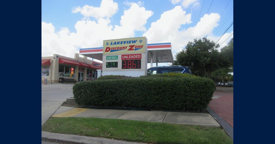 Gas station price sign in New Orleans showing unleaded gasoline at $3.86 a gallon