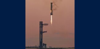 A SpaceX Starship booster approaches the launch tower during the IFT-5 flight test, in a file photo