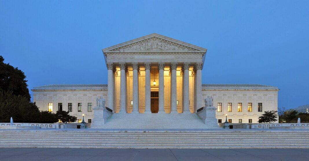 The U.S. Supreme Court building at dusk