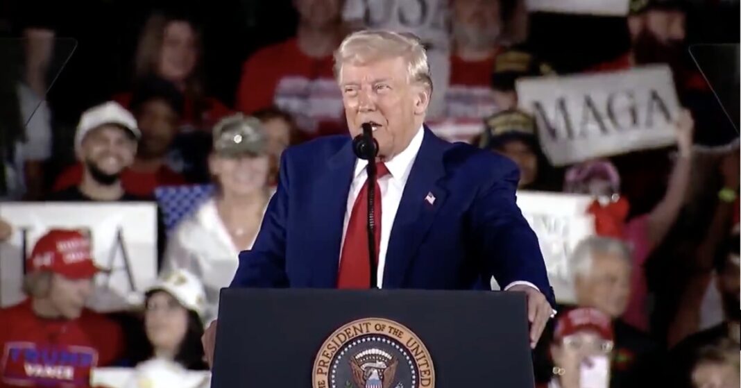 File photo of President Donald Trump speaking at a rally, for the Trump Hyde-Smith Mississippi rally story