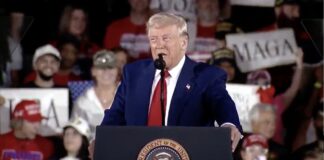 File photo of President Donald Trump speaking at a rally, for the Trump Hyde-Smith Mississippi rally story