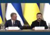 Ukraine, Finland Set Nearly €300M Cooperation Package Petteri Orpo and Volodymyr Zelenskyy seated before Finnish and Ukrainian flags at a news conference on Ukraine-Finland cooperation.