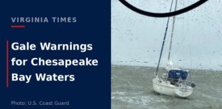 A sailboat in rough, choppy water in the Chesapeake Bay during severe weather near Cape Charles, Virginia.