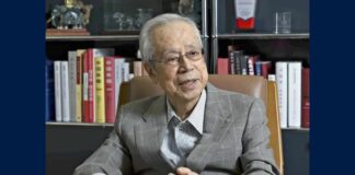 Yasuo Fukuda dies at 90; the former Japanese prime minister is pictured seated in front of bookshelves.
