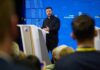 Zelenskyy Expects More Sanctions Relief, Seeks U.S. Talks Ukrainian President Volodymyr Zelenskyy speaking at a podium in Brussels during the European Council meeting, 15-16 October 2026