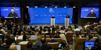 Volodymyr Zelenskyy speaks in Brussels during debate over Trump sanctions relief.