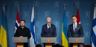 Volodymyr Zelenskyy at an Oslo press conference discussing Ukraine security guarantees.